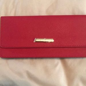 Michael Kors red clutch